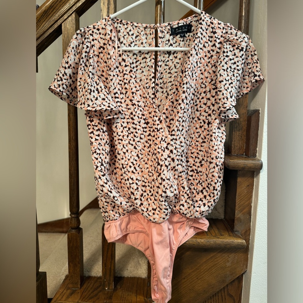 Pink patterned body suit